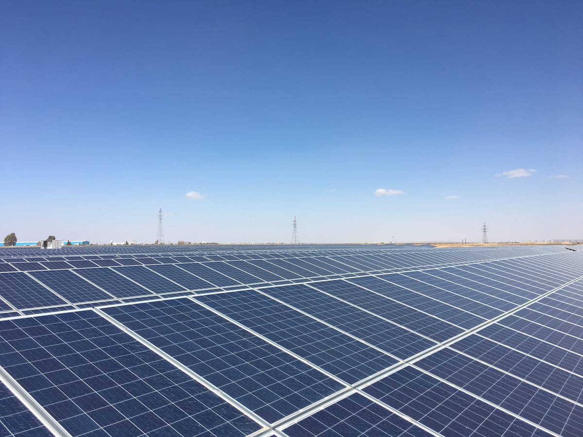 Huge solar cell park in front of a blue sky
