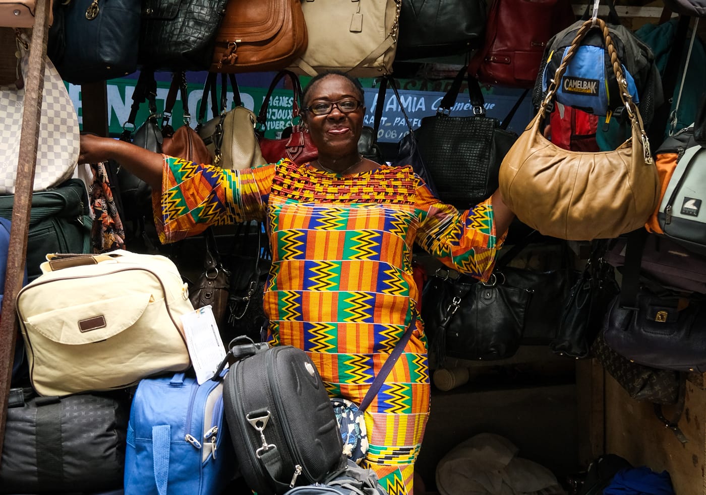 Portrait of a woman in her bag store